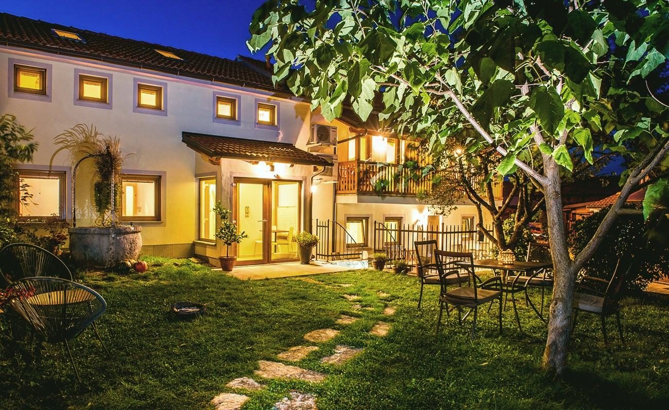 Zenja Apartmaji at dusk